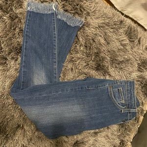 Skinny fringe bottom jeans